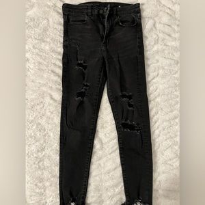 AMERICAN EAGLE next level stretch distressed black jeans